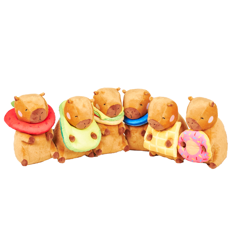 Capibaras by Plushmania — The full Capibara collection: six food-charm characters — burger, avocado, waffle, donut, watermelon and floatie — built as a collectible family.